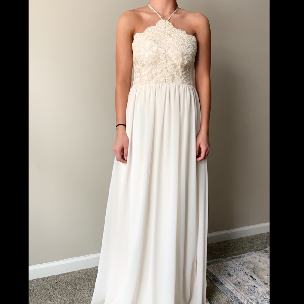 Cream lace prom dress.